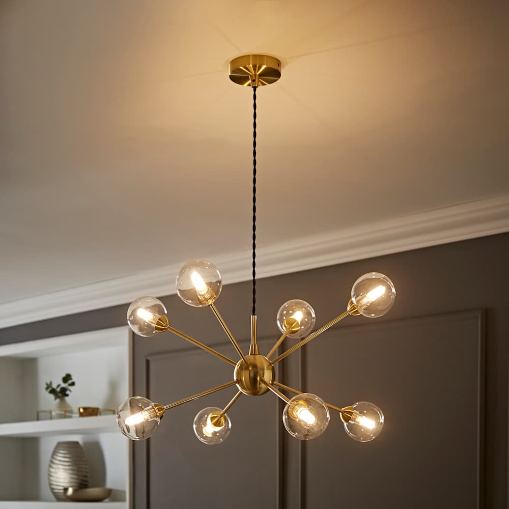 Sputnik multi-arm pendant with clear glass globes and a bold, sculptural design.