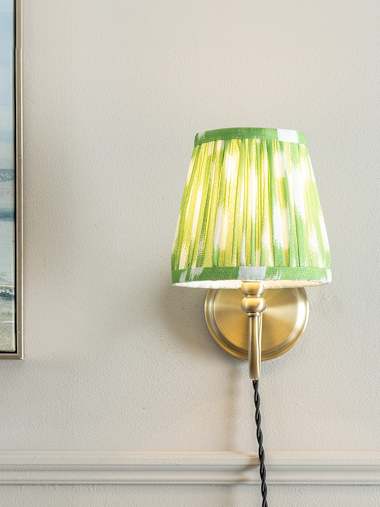 Neely Antique Brass Plug-in Wall Light with Green Gathered Shade