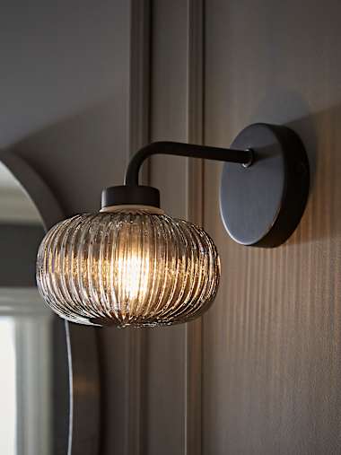 Amaia IP44 Matte Black Wall Light with Smoked Glass Shade