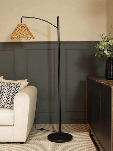 Curved Black Floor Lamp with Natural Rattan Flower Shade