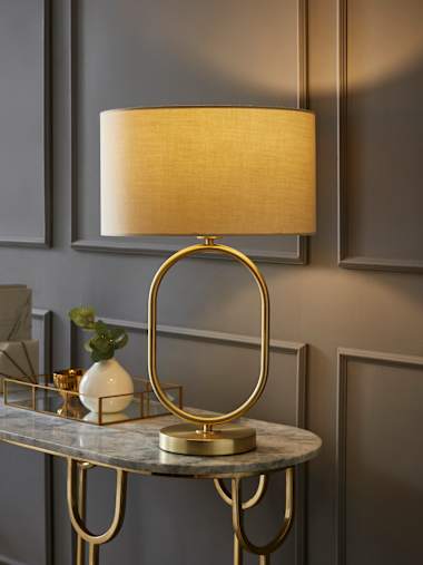 Antonia Brushed Gold Oval Table Lamp with Natural Fabric Shade