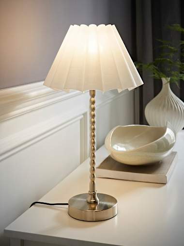 Maeve Brushed Chrome Bobbin Table Lamp with White Tapered Pleated Shade