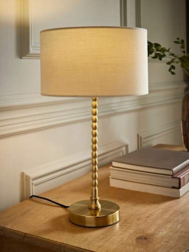 Maeve Brushed Gold Bobbin Table Lamp with Natural Fabric Shade