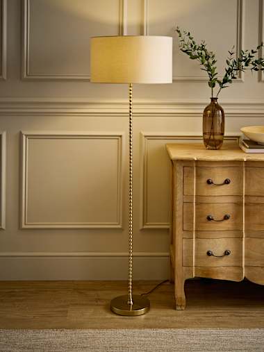 Brushed Gold Bobbin Floor Lamp with Cream Drum Shade