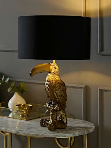 Brushed Bronze Toucan Table Lamp with Black and Gold Drum Shade