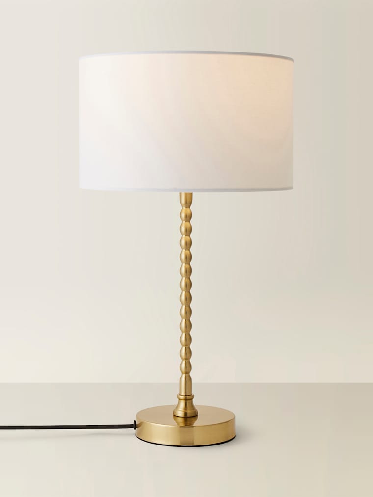 Brushed Gold Bobbin Table Lamp with White Fabric Shade