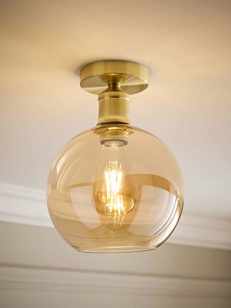 Brushed Gold and Amber Glass Globe Flush Ceiling Light